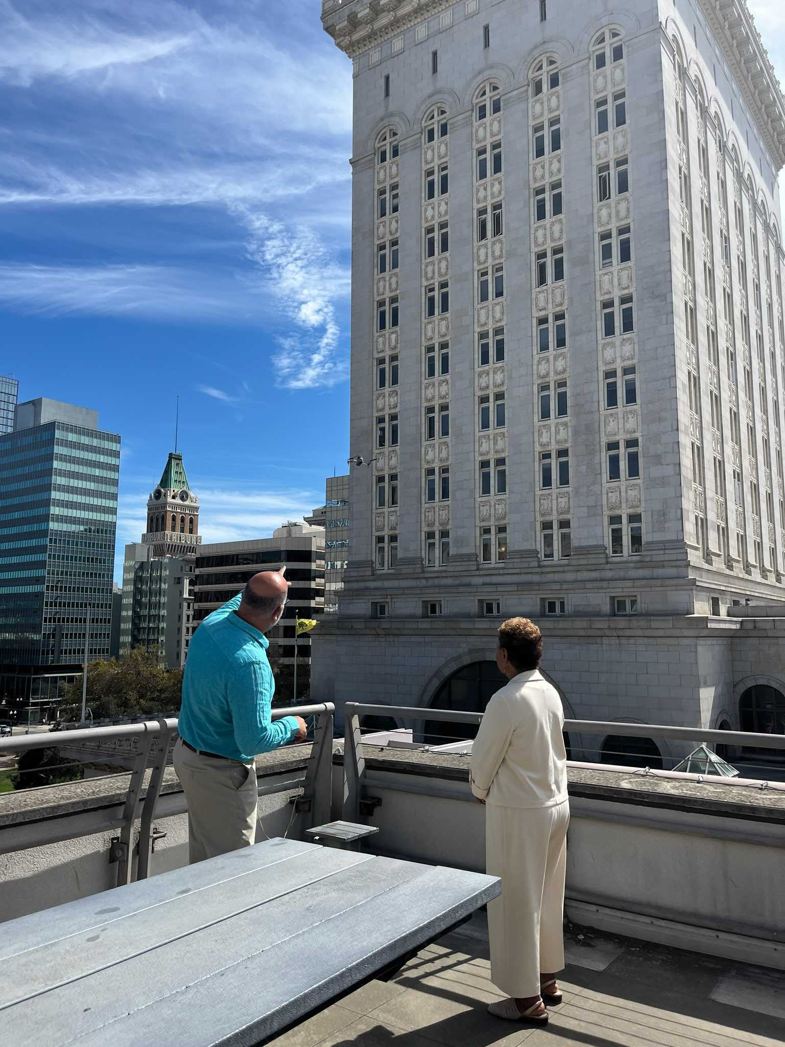 Aerbits founder Brian Johnson demonstrating the DJI Matrice 4E mapping drone to City of Oakland leadership on a downtown Oakland rooftop
