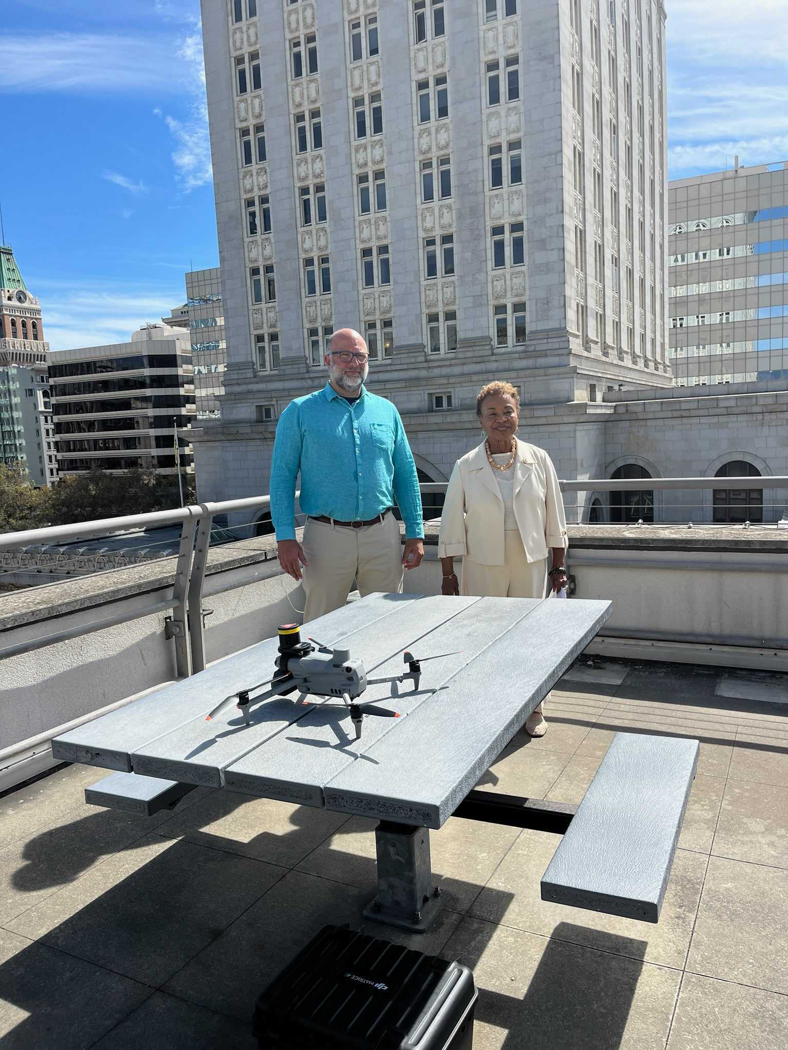 Aerbits team with Oakland city leadership overlooking downtown Oakland